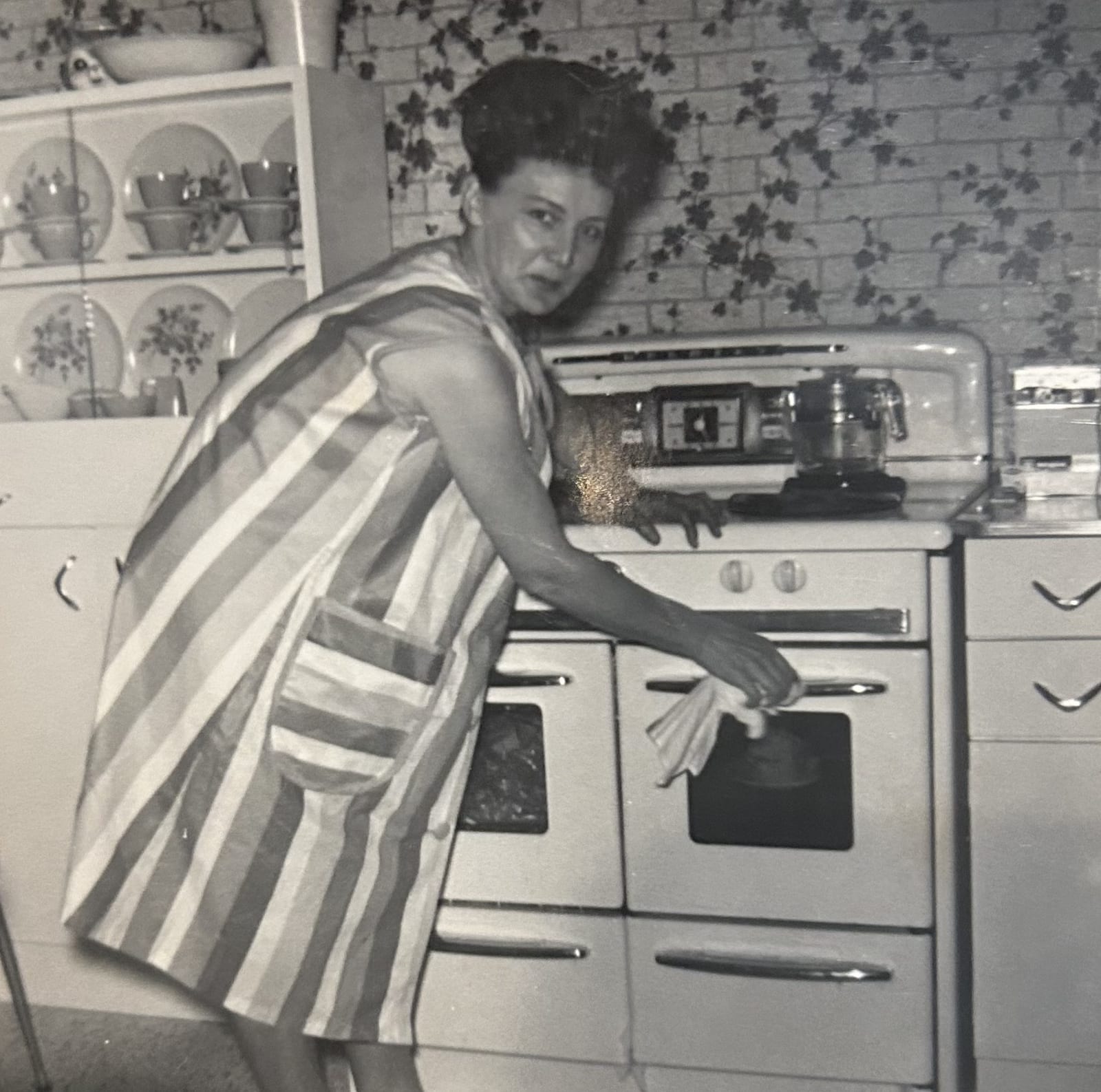 Her mother at the stove